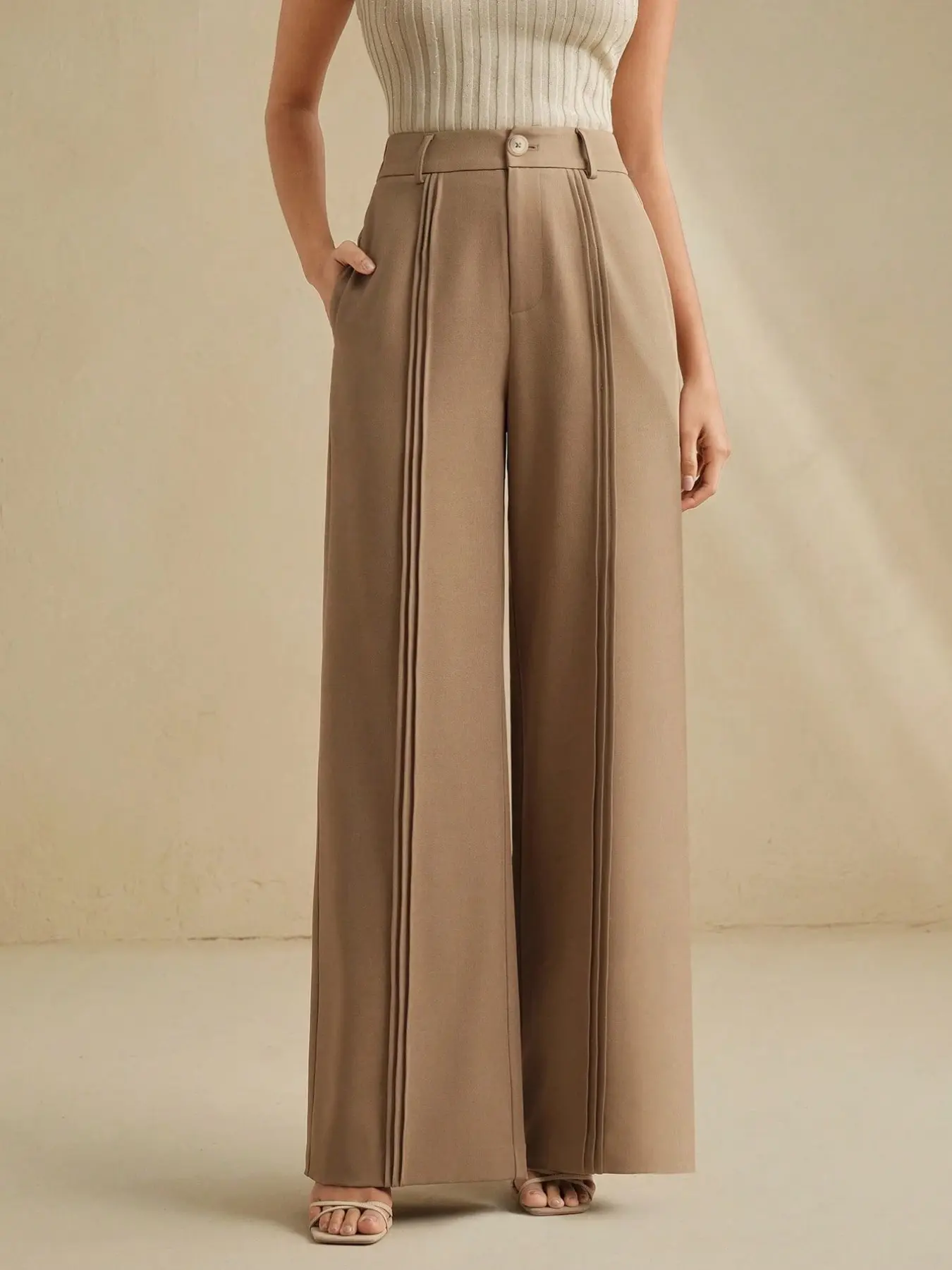 Elegant and sophisticated coffee-colored women's wide-leg suit pants with pleated leg detailing and Button, ideal for tall women