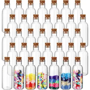 50 Pack 2 oz Clear Plastic Sand Art Bottles with Cork Stoppers Sand Art Containers Jar with Lid Mini Potion Bottles for DIY Wedding Party Favors Wish and Message Bottle(Wood Color)fidget toys