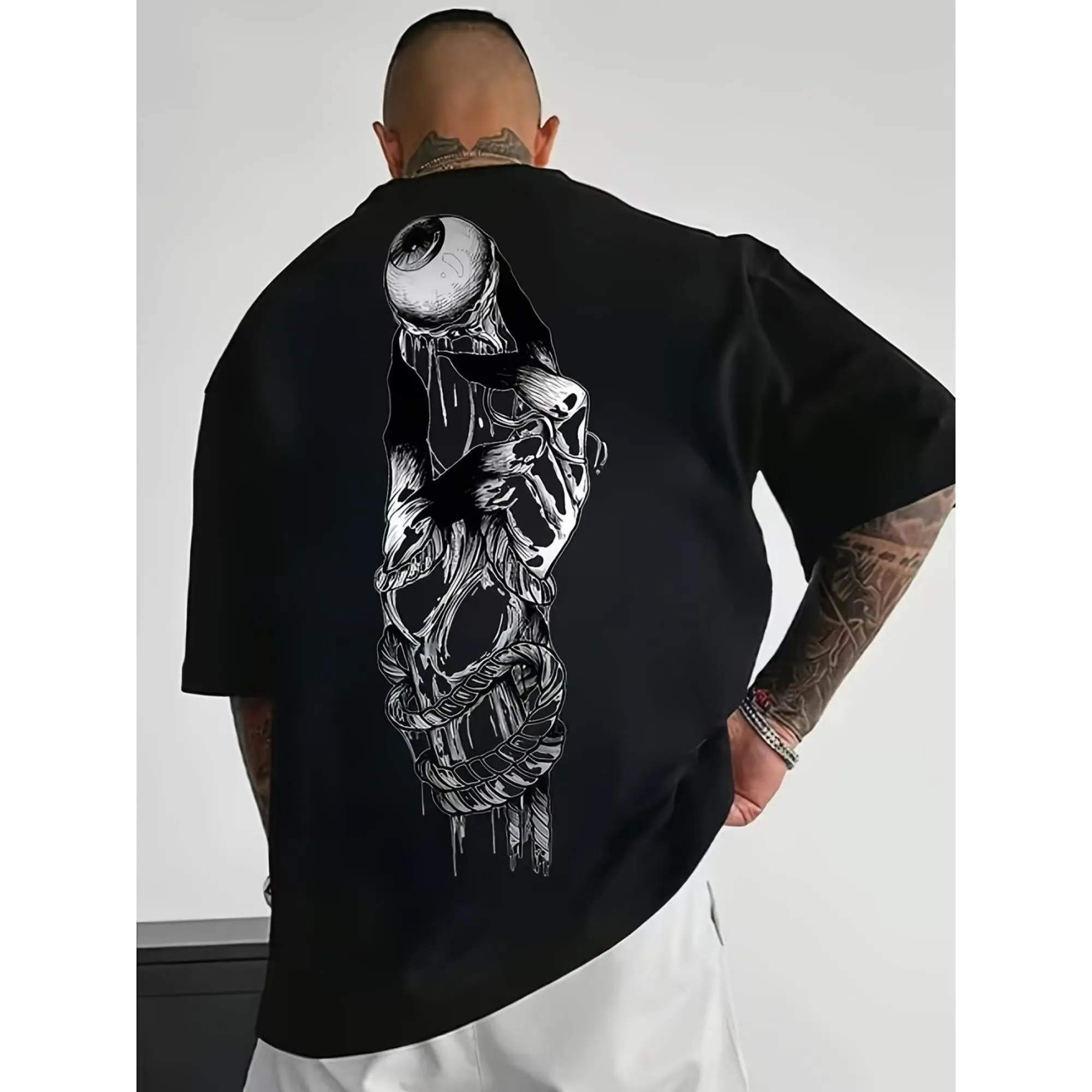 Men's Black Graphic T Shirt, Featuring a Striking White Eye Design with Dark Anatomical Elements, Perfect for Those Who Appreciate Unique And Edgy Fashion Ideal for Casual Outings Or Making a Statement, This Trendy Offers a Comf