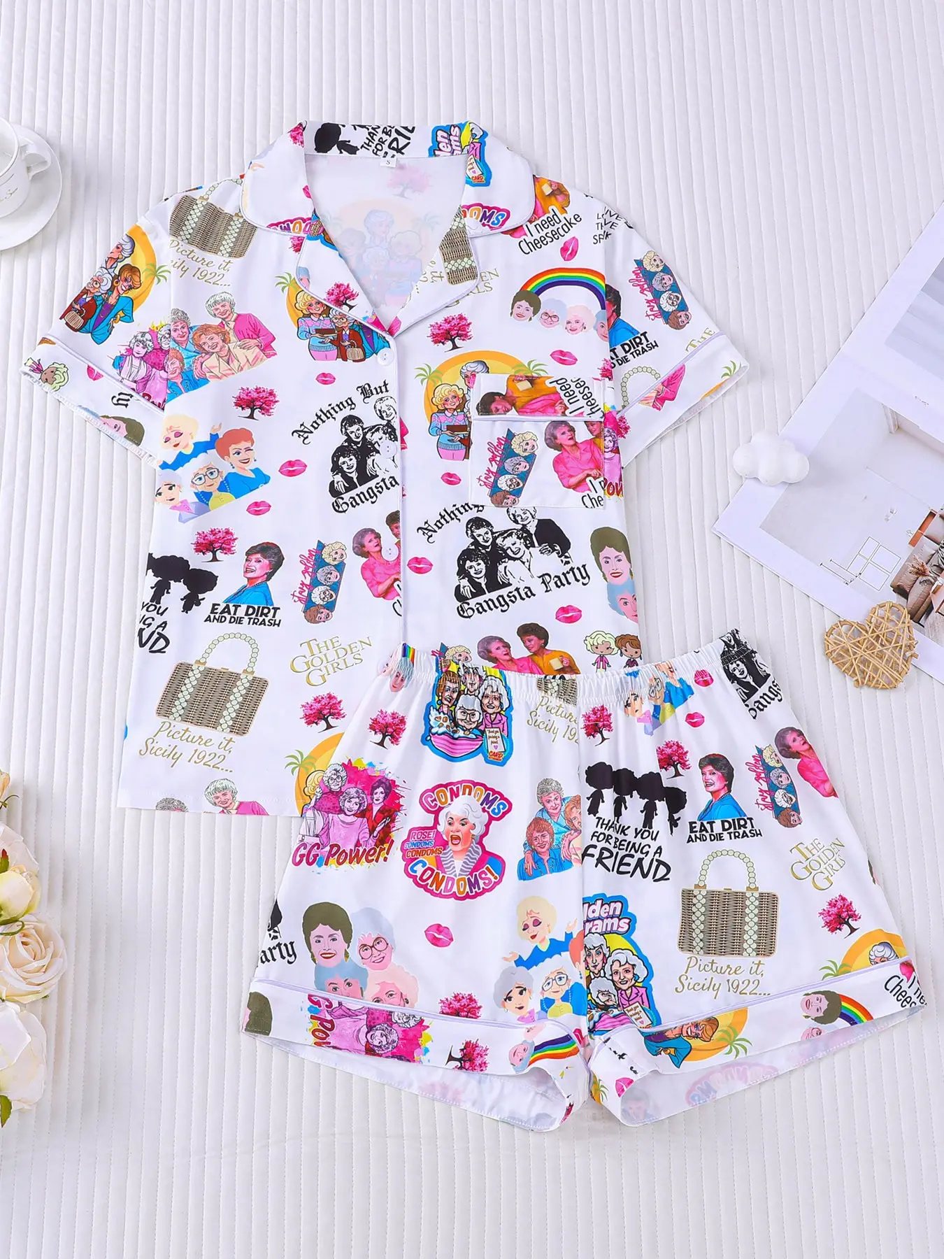 Women's 2-piece pajama set Pjs, white base fully printed with classic The Golden Girls characters and funny quotes, retro quirky American style. Notched lapel top with chest pocket, elastic waist shorts, soft breathable loungewear for women all year round