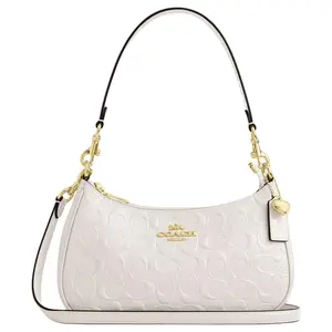 COACH Teri 25 Crossbody Handbag for Women – Classic Logo Pearlized Patent and Smooth Leather, Medium Size, White