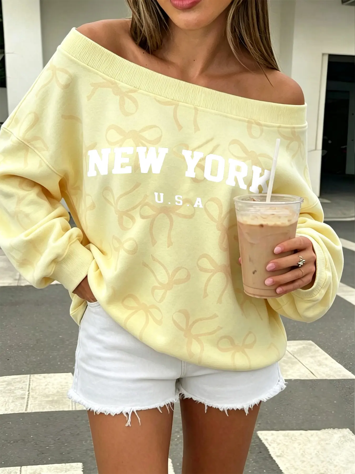 Autumn yellow bow print off-shoulder sweatshirt, loose New York USA pattern lazy long-sleeve top, fashionable women's daily casual outfit #OffShoulderSweatshirt