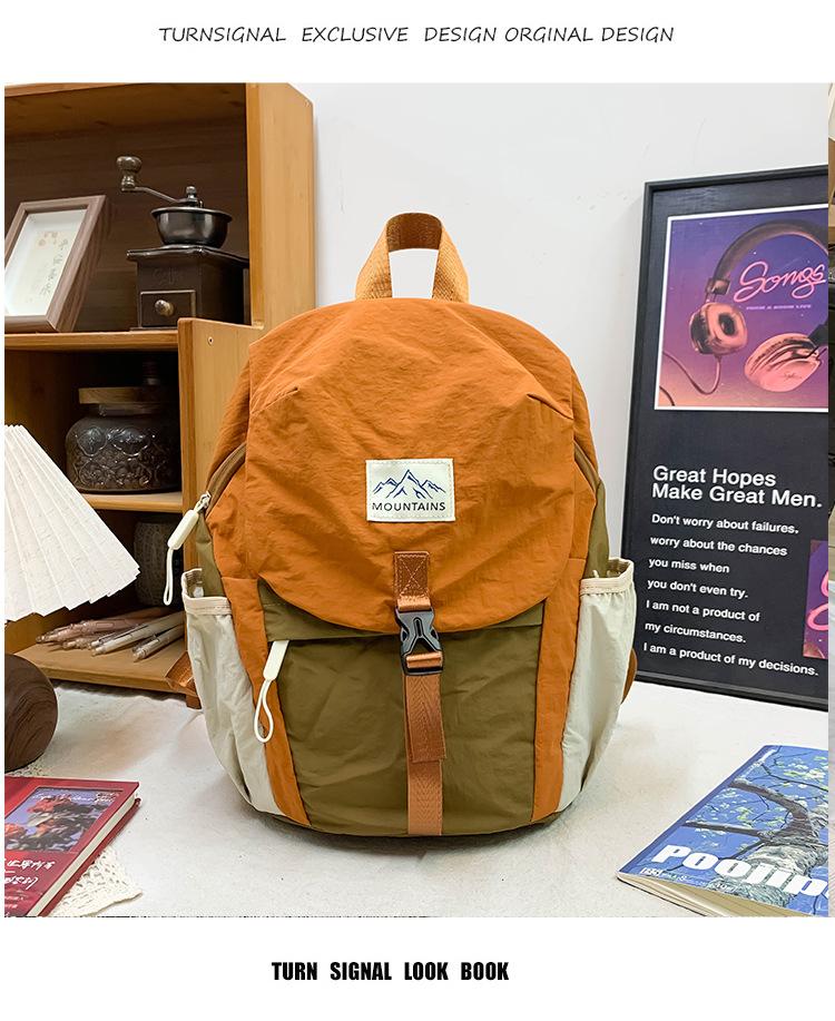 Korean-style trendy and cool unisex children's backpack, color-blocking, large capacity, elementary school student schoolbag, casual sports children's travel backpack